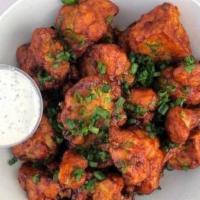 Sweet & Sour Cauliflower Wings · Gluten-free, vegan cauliflower wings tossed in our sweet and sour sauce and served with hous...