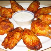 Tandoori Wings (10) · Chicken wings deep-fried, then dipped in tandoori sauce.