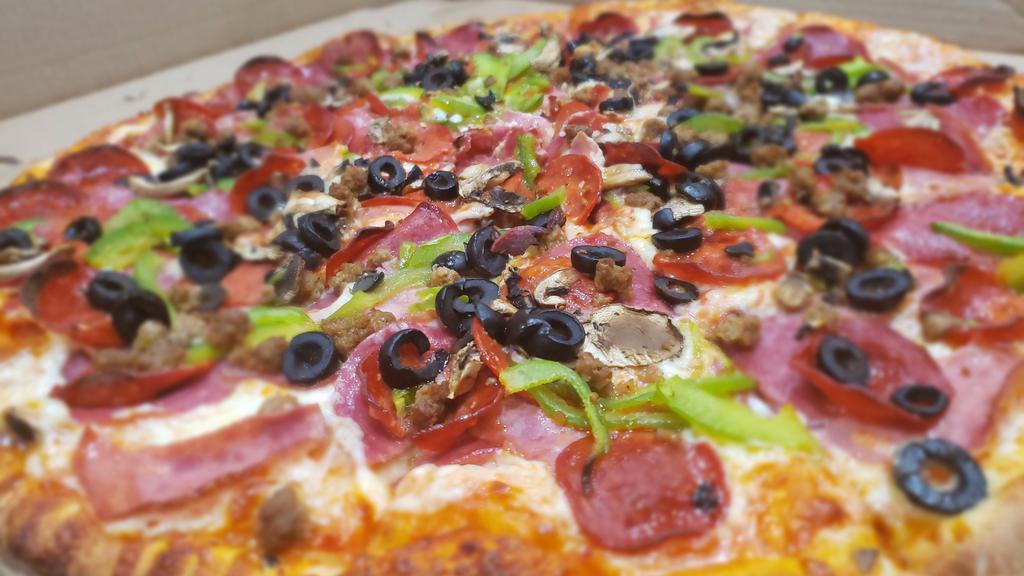 Combination Pizza · Salami, pepperoni, turkey ham, bell peppers, olives, mushrooms, and sausage.