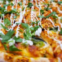 Butter Chicken Pizza · With butter chicken sauce, butter chicken, red onions, ginger, bell peppers, diced tomatoes,...