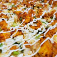 Chicken Tikka Masala Pizza · Tikka sauce, cheese, cauliflower, chicken tikka, garlic, ginger, green onion, fresh cilantro...