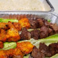 Combination Chicken & Tekah Kabob · Charbroiled beef and chicken shish kabobs marinated with special Afghan seasoning, served wi...