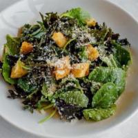 Kale Caesar Salad · Baby Kale, Caesar Dressing, Sourdough Croutons, Parmigiano Reggiano.