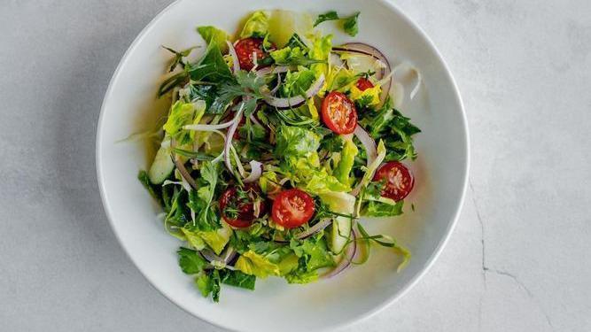 Chop Salad · Gem Lettuce, Green Cabbage, Cherry Tomato, Cucumber, Red Onion, Soft Herbs, Red Wine Vinaigrette.