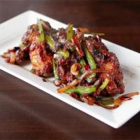 CHICKEN DRUMS OF HEAVEN · Chicken wings with green bell pepper, onion, Thai chilli, dry red chilli