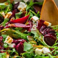 Beet Salad · beets with arugula, orange, roasted almonds, crumbled goat cheese and grainy mustard dressing