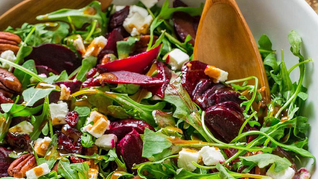 Beet Salad · beets with arugula, orange, roasted almonds, crumbled goat cheese and grainy mustard dressing