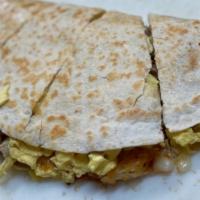 Breakfast Starter Quesadilla · Your choice of meat with scrambled egg, hashbrowns and melted mozzarella cheese stuffed in a...