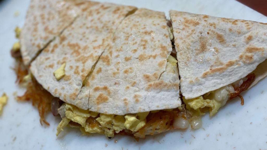 Breakfast Starter Quesadilla · Your choice of meat with scrambled egg, hashbrowns and melted mozzarella cheese stuffed in a crisp, flour tortilla, served with a side of salsa ranch.