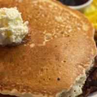 Pancake Breakfast · Two buttermilk, pancakes with one *egg, and your choice of meat listed below; bacon, ham, ja...
