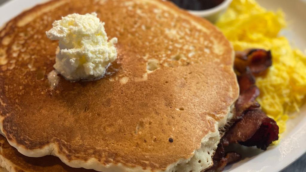 Pancake Breakfast · Two pancakes, choice of meat and one egg any style. (no substitutions)