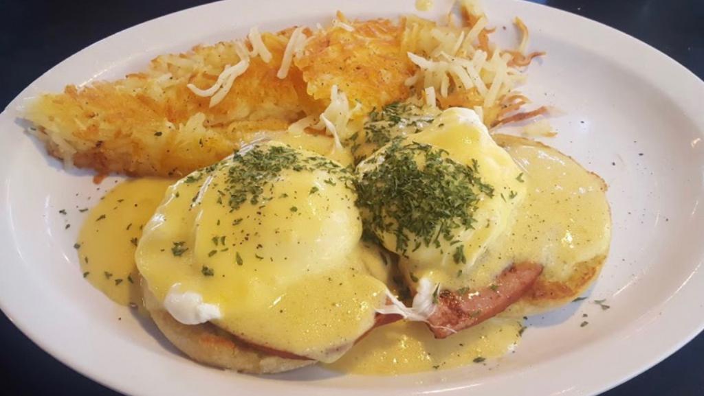 Eggs Benedict · Lumpy's signature eggs benedict... grilled English muffin, topped with ham, poached eggs and creamy hollandaise sauce