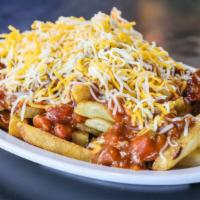 Cali Fries · Basket of fries topped with bbq pulled pork, cheddar cheese, sour cream and bacon.