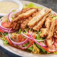 Fried Chicken Salad · Fresh romaine lettuce topped with crispy fried chicken strips, onions, tomatoes and shredded...