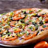 Peace In The Middle East Pizza · Homemade hummus, vine ripe tomatoes, kalamata olives, caramelized onions, feta, fresh basil,...