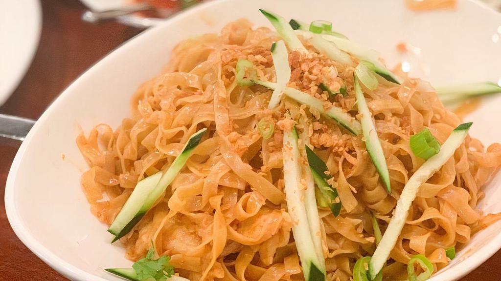 Burmese Garlic Noodle · Our egg flour noodles, tossed with fried garlic, scallions cucumbers, garlic oil and oyster sauce. Served with a sweet chili sauce and jalapeños.