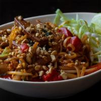 Burmese Pad Thai · Gluten-free. Rice noodles mixed with tofu, red bell peppers, cabbage, onions, scallions, bea...
