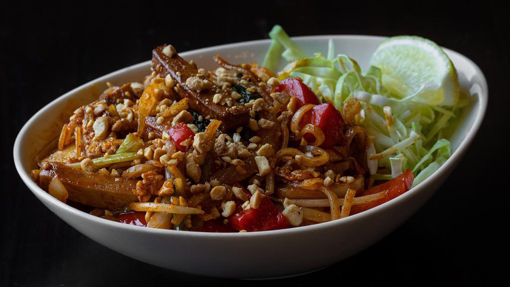 Burmese Pad Thai · Gluten-free. Rice noodles mixed with tofu, red bell peppers, cabbage, onions, scallions, bean sprouts, egg, peanuts turmeric, paprika and fish sauce.