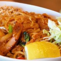 Burma Burma Noodle · Wheat noodles tossed with tofu, cucumbers, cilantro, tomatoes, cabbage, red onions, fried on...