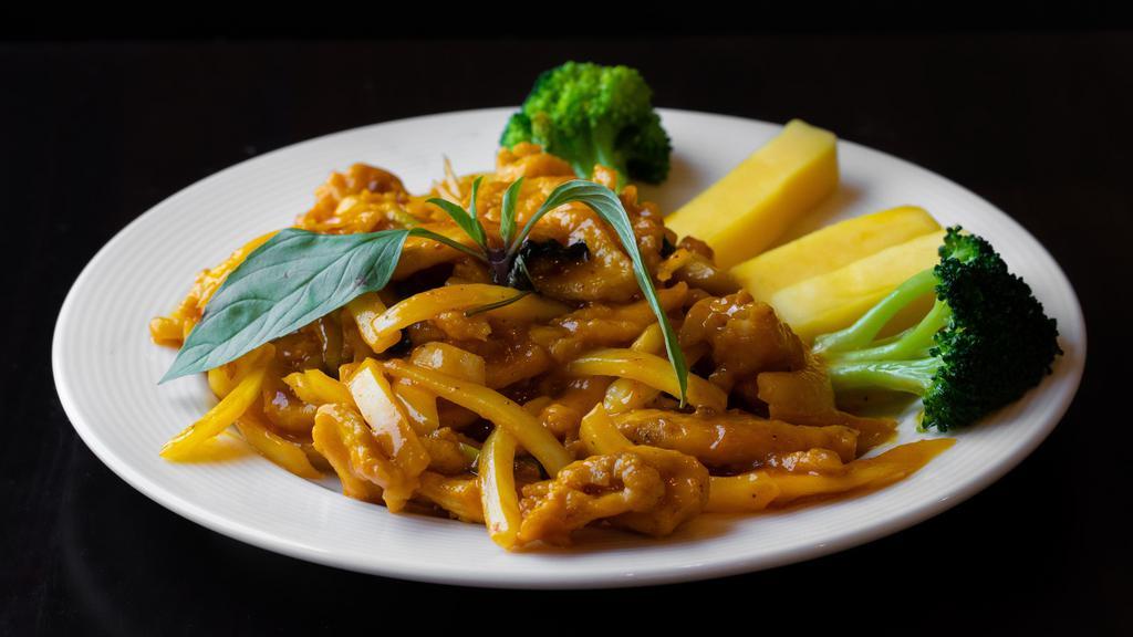 Mango Chicken · Marinated chicken tossed in a wok with soy sauce, white pepper, basil, onions, sambal chili and mango puree. GFS.