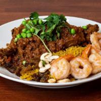 Chicken and Shrimp Biryani · Chicken leg and thigh stewed in tomato, onions, garlic, turmeric served with our burmese Ind...