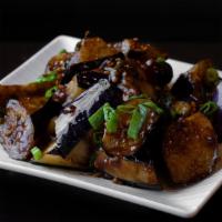 Eggplant and Garlic · Sautéed eggplant with garlic, ginger, scallions, basil, soy sauce and dried chilies. GFS.