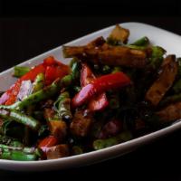 Tofu and Vegetables · Stir fried tofu, with string beans, bell peppers, garlic, ginger, basil, soy sauce and veget...