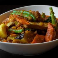 Mixed Vegetables Curry · Gluten-free. Onion based curry with eggplant, tomatoes, string beans, cabbage, broccoli, opo...