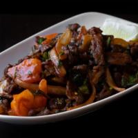 Beef Kebat · Gluten-free. Marinated tri tip stir-fried with onions, tomatoes, mint, cilantro, jalapeños, ...