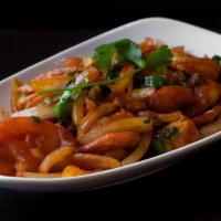 Shrimp Kebat · Gluten-free. Marinated shrimp stir-fried with onions, tomatoes, mint, cilantro, jalapeños, t...