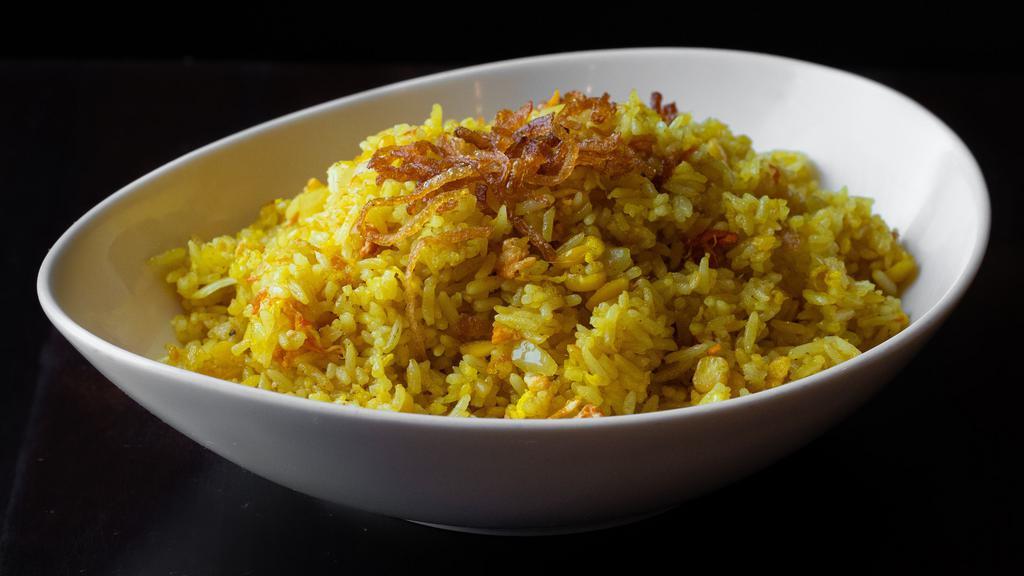 Home Style Fried Rice · Gluten-free. Choice of jasmine or brown rice with onions, yellow beans, turmeric, fried onions and egg.