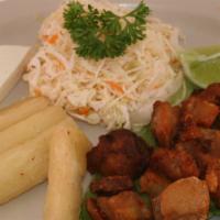 Yuca Frita · Fried yuca paired with fried pork