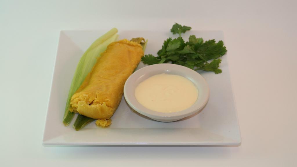 Tamal De Elote Con Crema · Sweet corn tamale with sour cream.