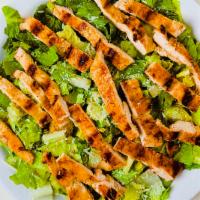 Caesar Salad · Romaine lettuce and croutons mixed in our Caesar dressing.