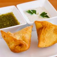 Veggie Samosa (2 Pieces) · comes with 2 pieces of short pastry pockets, filled with potato, vegetables, light spice, se...