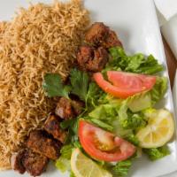 Lamb Kabob · Tender pieces of lamb marinated in special spices and garlic, broiled on a skewer.