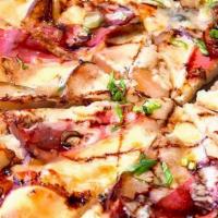 Prosciutto Pizza · San Marzano tomatoes, mozzarella, arugula, and cherry tomatoes.