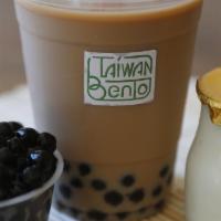 Boba Milk Tea · Our Brown Sugar Milk Tea (made with fresh milk and house brewed black tea) with boba pearls....