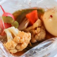 Pickle Bag · Pickled eggs and seasonal vegetables in vinegar, sugar and chili flakes. Served in a bag jus...