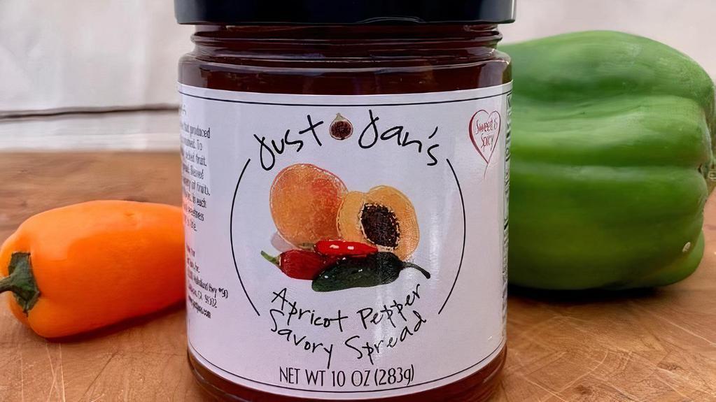 Just Jans Apricot Pepper Savory Spread · More spicy than hot, Just Jan’s Apricot Pepper can give a sweet kick to any dish.  A fusion of apricots, red bell pepper, and jalapeno, this spread is a great complement to cheeses, sauces, or your favorite sandwich.