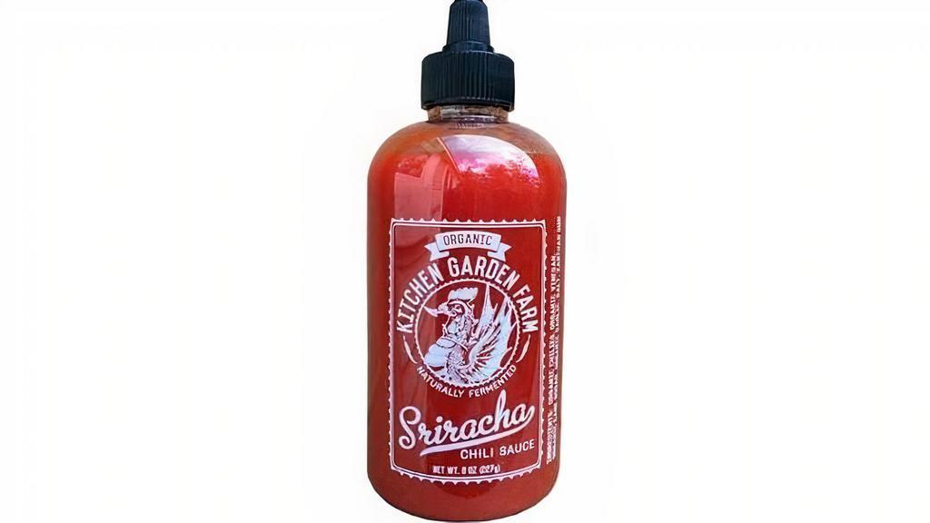 Sriracha Chili Sauce · All of the chilis used in this sauce are grown on the USDA certified organic farm. They're harvested and fermented for seven days, then cooked and pureed. The result is a sriracha with an incredibly fresh fruity pepper flavor.