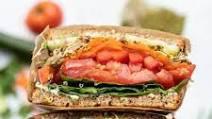 Veggie Sandwich · Tomatoes, bell peppers, red onion, hummus, and mixed greens on wheat, sourdough, or white br...