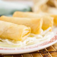 Egg Rolls (4) 春捲 · Cabbage, carrots, and onions wrapped into a roll. Deep-fried to golden brown.