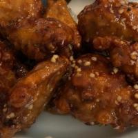 Fried Chicken Wings (Szechuan Style) 乾烹雞翅 · 8 fried chicken wings glazed with sweet, spicy, garlicky  Sze Chuan sauce