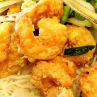 Salt & Pepper Prawns 椒鹽蝦 · Shell-less prawns lightly battered then toss-cooked with onions and jalapenos.  Seasoned wit...