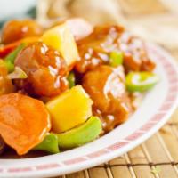 Sweet & Sour Pork 古老肉 · Cubes of lean pork filet deep-fried in batter, cooked with carrot, bell peppers, onions & pi...