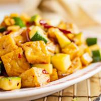 Kung Pao Tofu 宮保豆腐 · Tofu sauteed with zucchini, bamboo shoots, and peanuts, in spicy Kung Pao sauce.