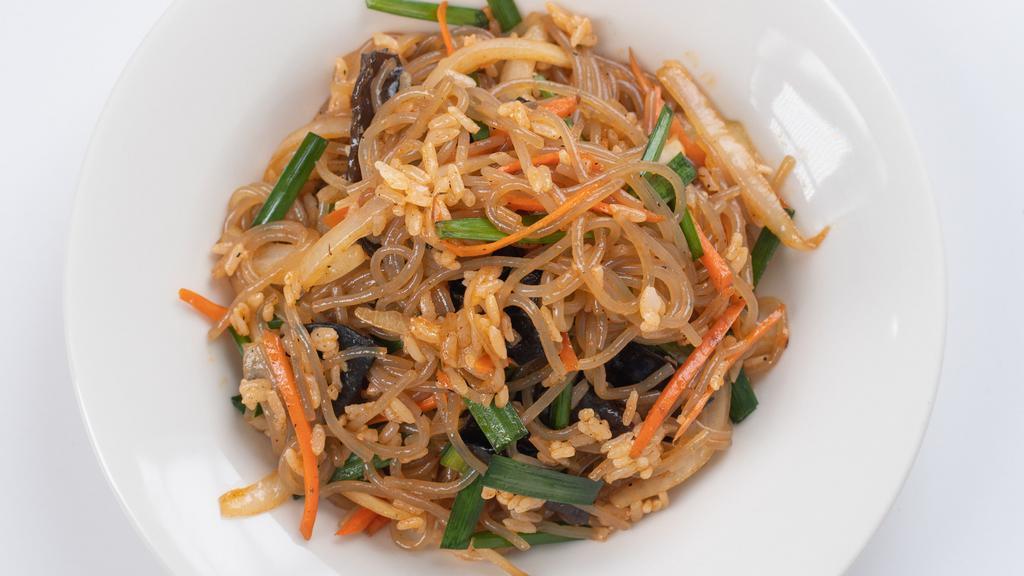 Japchae Bap (vv) · Vegan. Vermicelli, white rice, onion, carrot, garlic chive, wood ear mushroom. 
Contains soy, wheat.