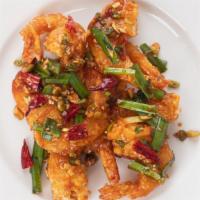 Kkanpoong Saewoo · Fried prawn, scallion, garlic chive, dried chili, garlic, ginger. 
Contains shellfish, egg, ...