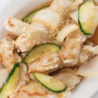 Tang Soo Yook · Fried pork, cucumber, onion, sweet and sour gravy. Contains egg, soy, wheat.